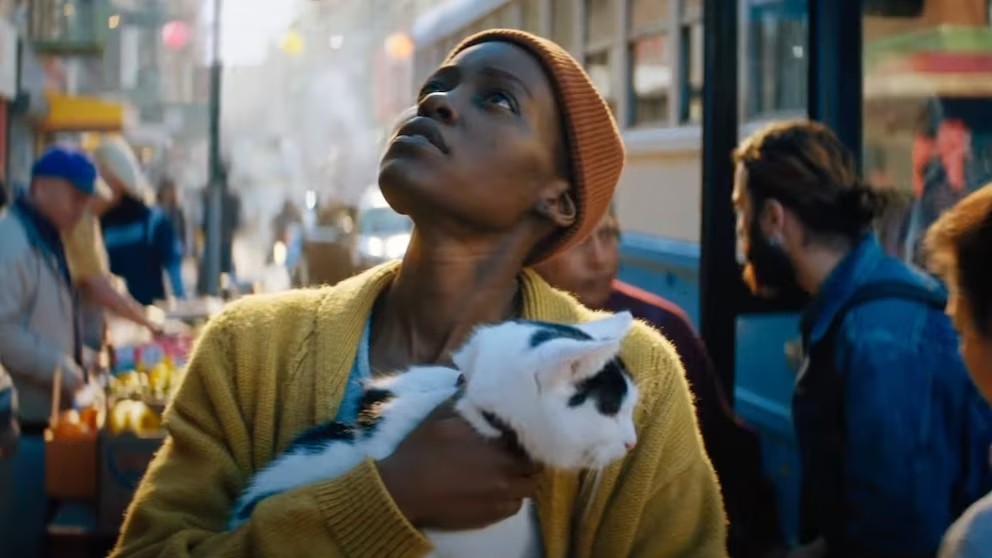 Lupita Nyong’o with a cat