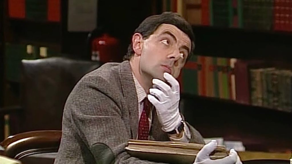 Rowan Atkinson in and as Mr. Bean 