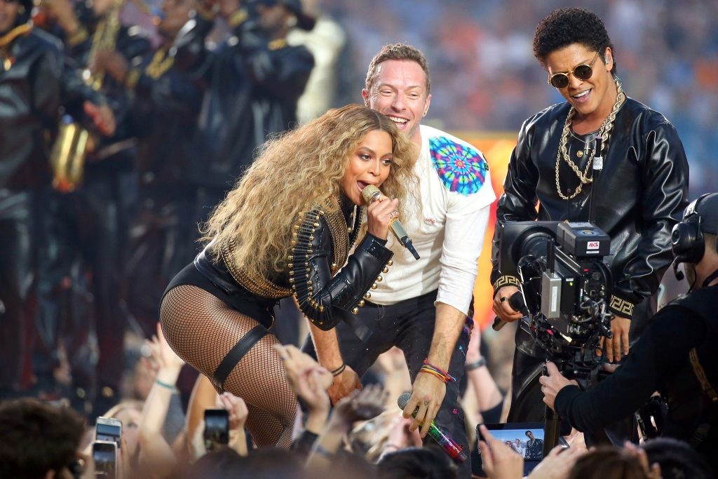 Coldplay's Chris Martin performing with Beyonce and Bruno Mars at Super Bowl L