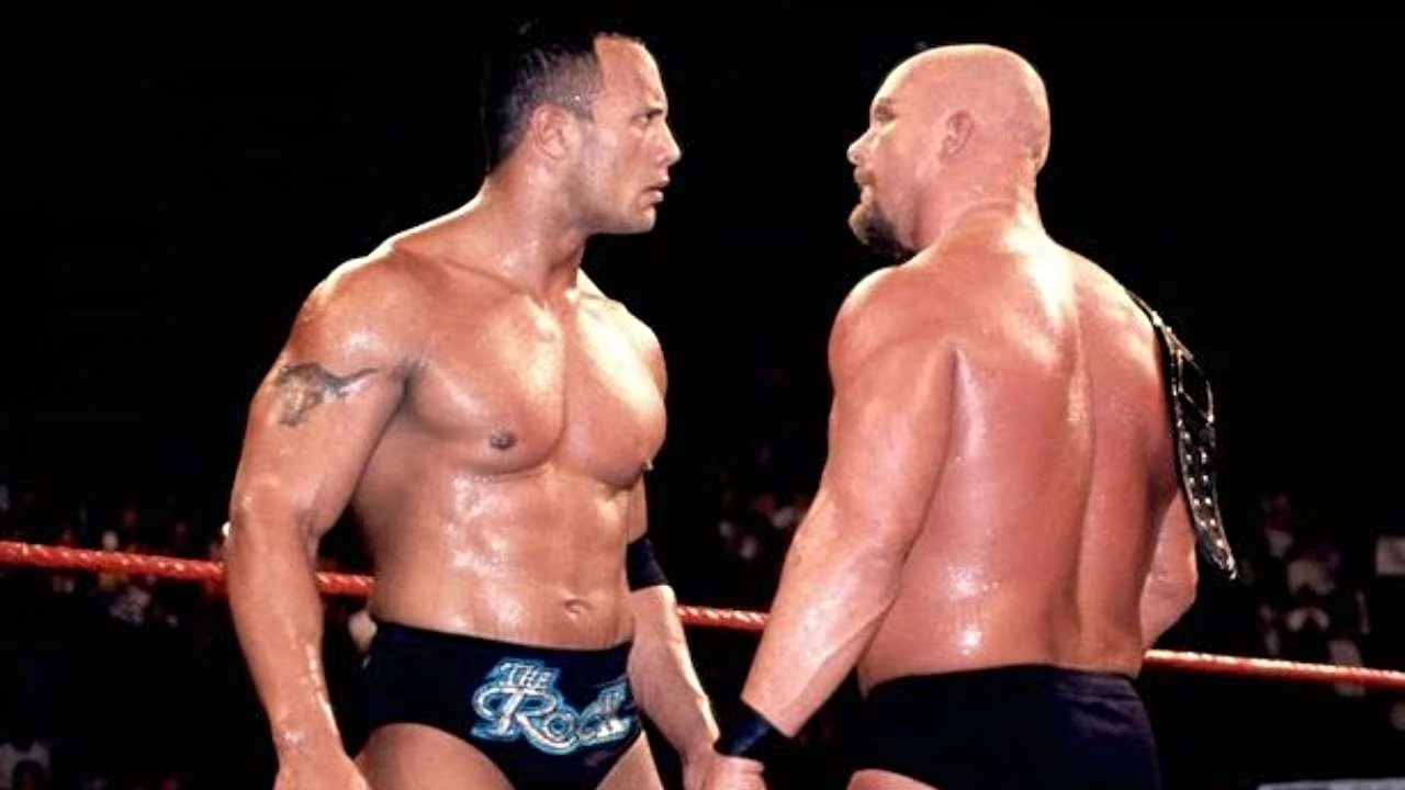 The Rock and Steve Austin staring at each other