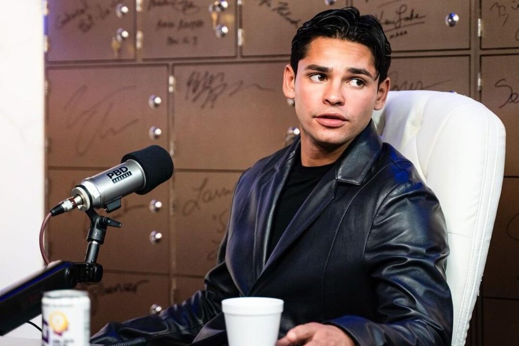 Ryan Garcia sitting in front of a mic