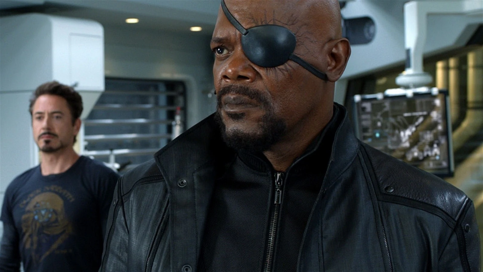 Samuel L. Jackson staring worried in this scene with Robert Downey Jr. 