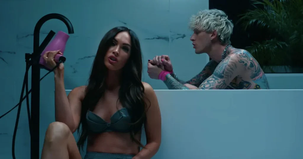 Megan Fox and Machine Gun Kelly in a still from their music video Bloody Valentine 