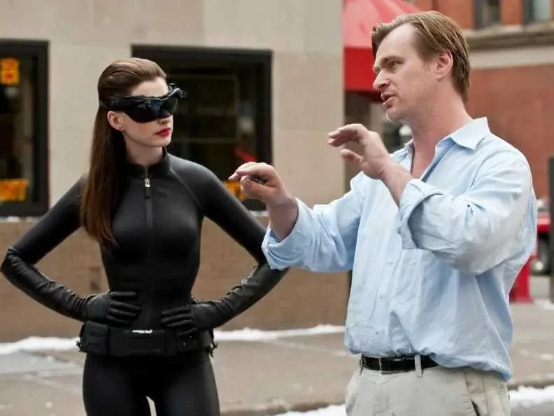 Anne Hathaway and Christopher Nolan on the sets of The Dark Knight Rises