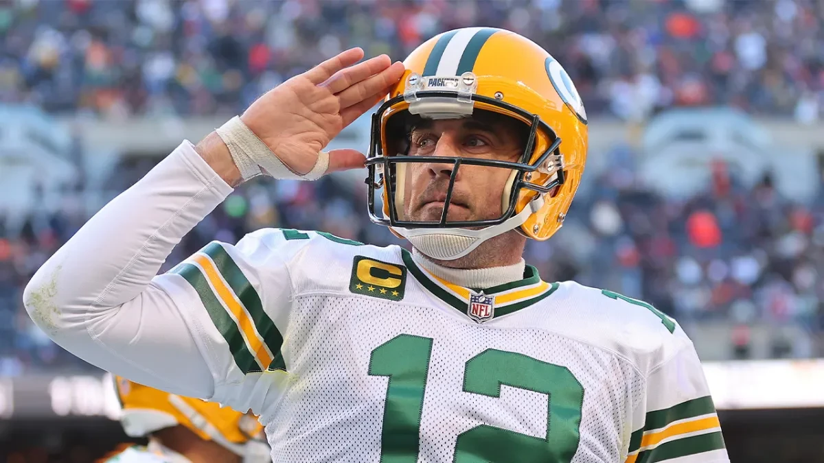 Aaron Rodgers saluting during an NFL game 