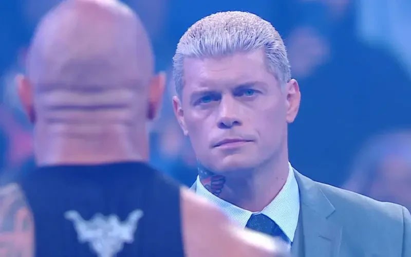 Cody Rhodes looking at The Rock in this scene 