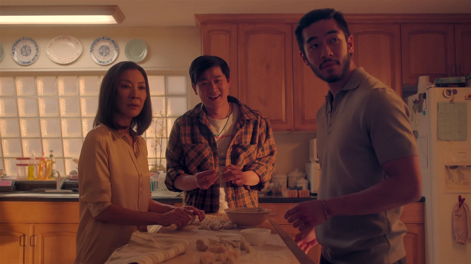 Michelle Yeoh, Sam Song and Justin Chien in The Brothers Sun 