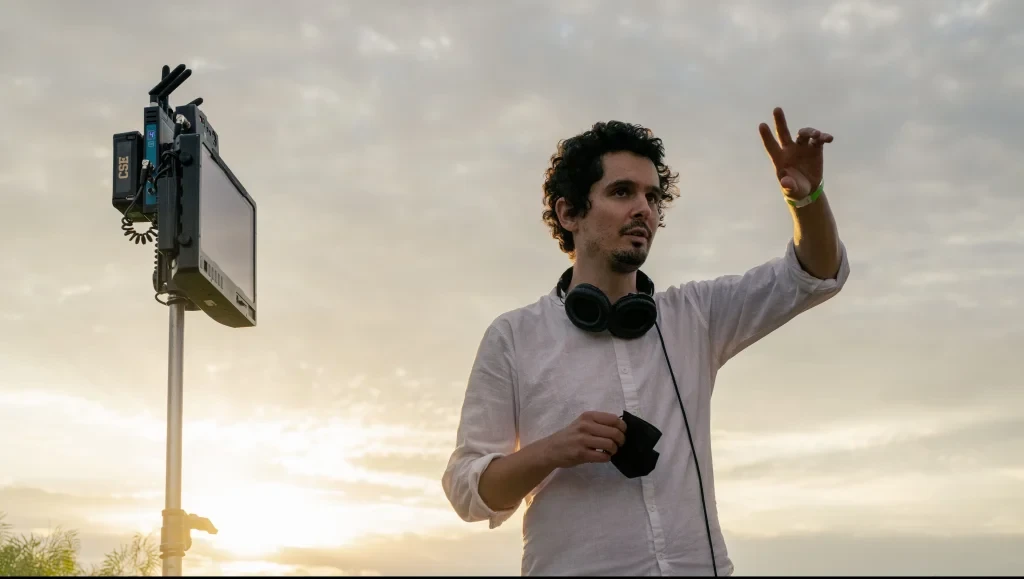 Damien Chazelle on the sets of Babylon | Credits: Paramount