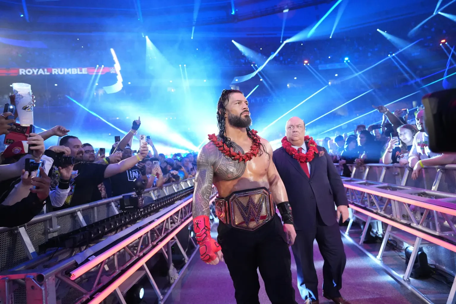Roman Reigns and Paul Heyman (image via WWE)