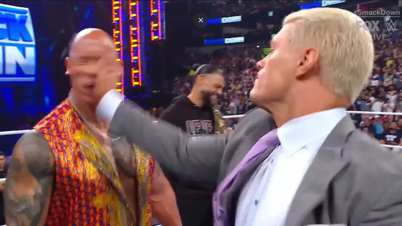 Cody Rhodes slaps The Rock