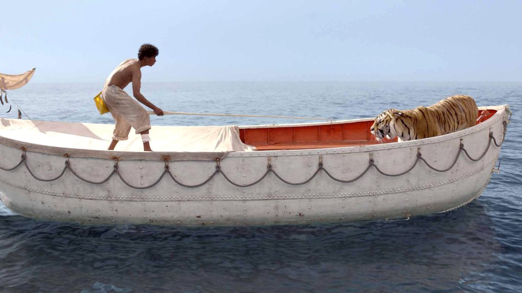 Life of Pi - tiger and man in a struggle.