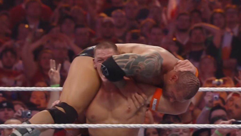 John Cena and Dave Bautista during one of their many fights (Image via: WWE | YouTube)