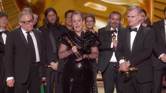 The cast and crew of Oppenheimer receiving the Oscar for Best Picture 
