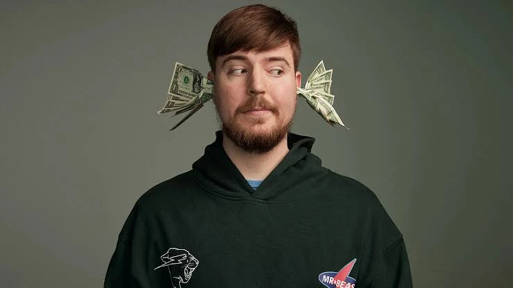 MrBeast with money in his ears