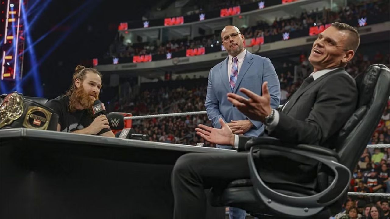 Sami Zayn (L) and Gunther (R) during contract signing on Raw