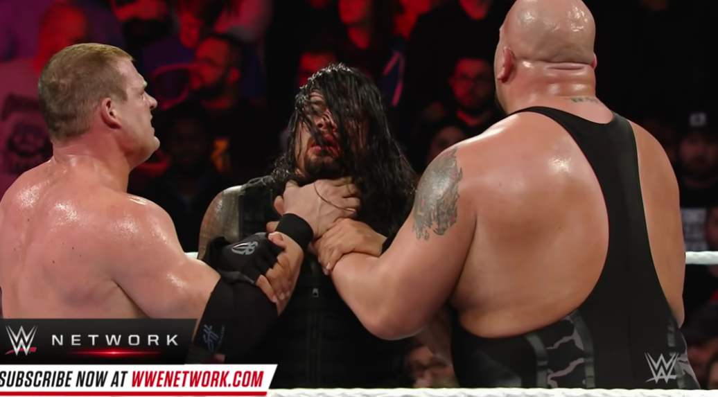 Kane and Big unleashing on Roman Reigns at the 2015 Royal Rumble