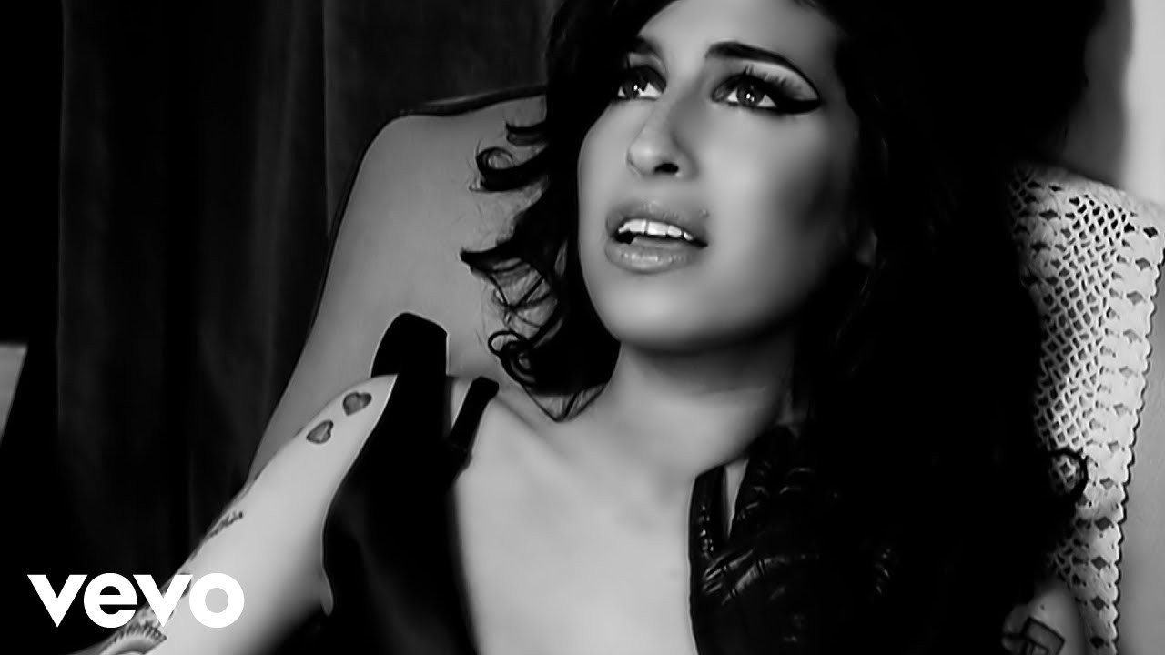Amy Winehouse in the music video for Back to Black