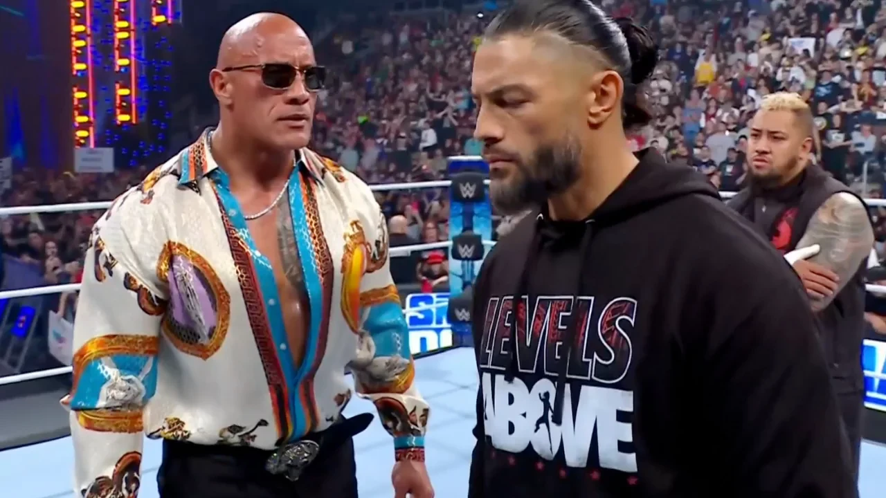 Dwayne Johnson and Roman Reigns in a still from WWE SmackDown
