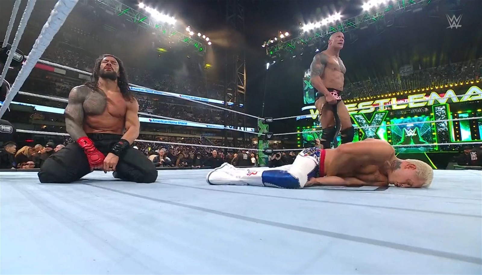 The Rock & Roman Reigns win the tag match defeating Cody Rhodes and Seth Rollins | Credit- Twitter: @ibeastIess)