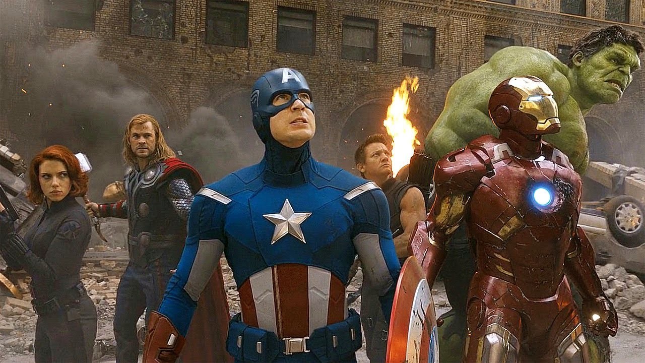 Chris Hemsworth and Robert Downey Jr. with the other Avengers actors in 2012's The Avengers