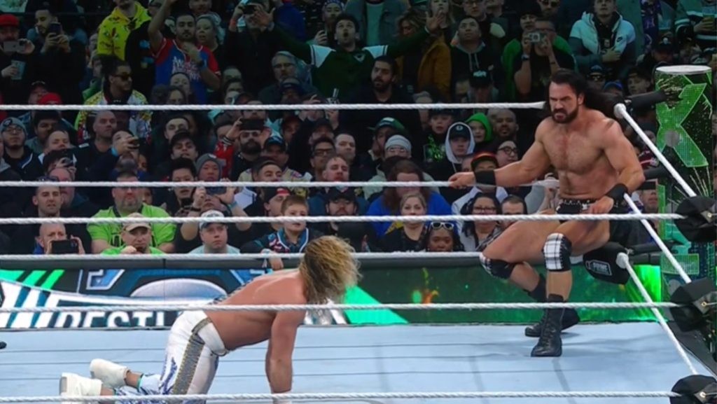 Rollins and McIntyre inside the ring during WrestleMania 40