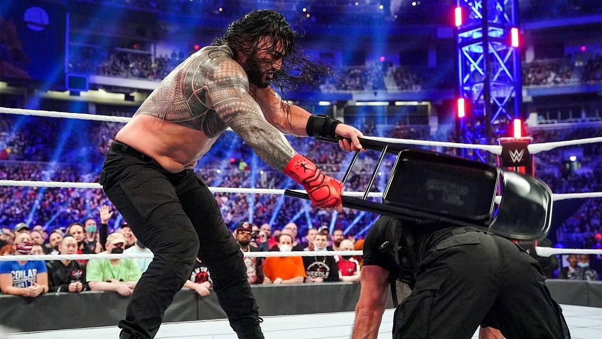 Roman Reigns hit Seth Rollins many times with a chair.