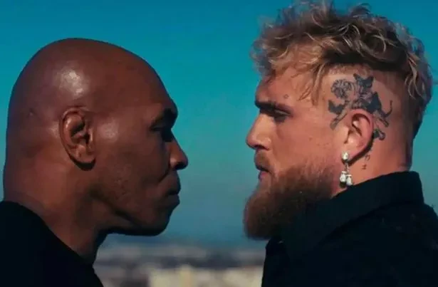 Jake Paul (L) and Mike Tyson (R) Face off