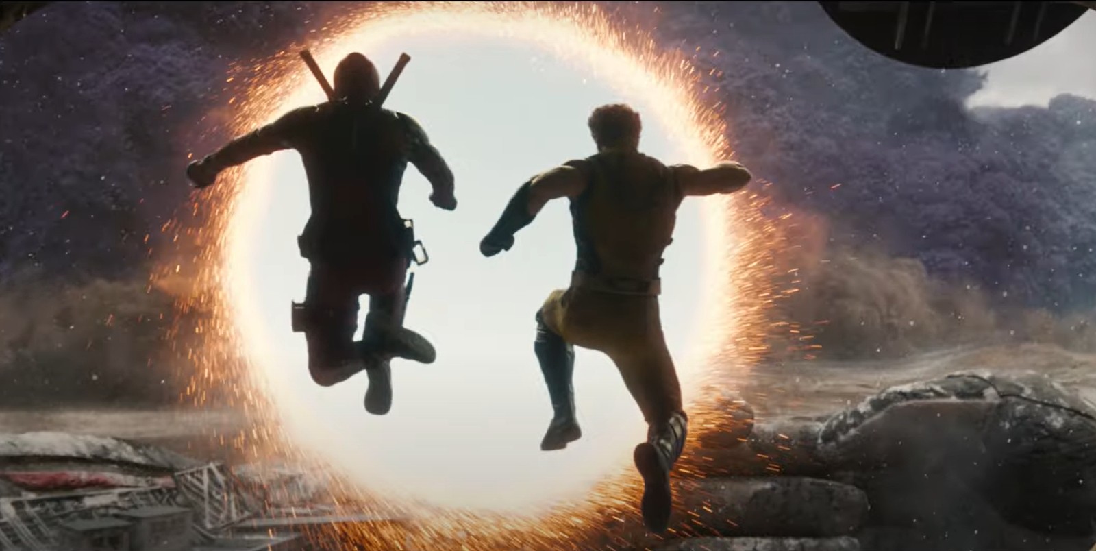 Deadpool and Wolverine jump into a portal in Deadpool 3