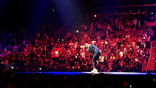 Kendrick Lamar performing at the Staples Center in LA on The Yeezus Tour (2013) [Photo- Wikimedia Commons]