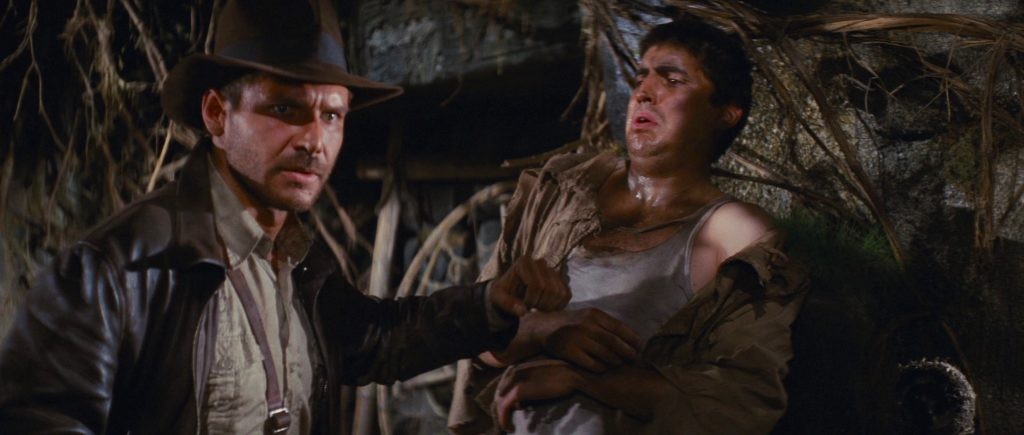 Harrison Ford and Alfred Molina in a scene in Raiders from the Lost Ark