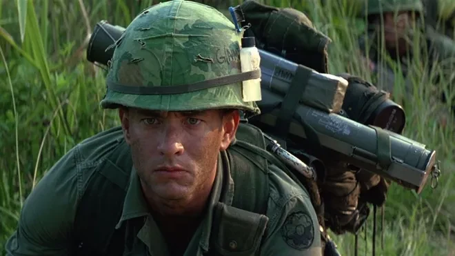 Tom Hanks hiding under the grass during the Vietnam War in Forrest Gump