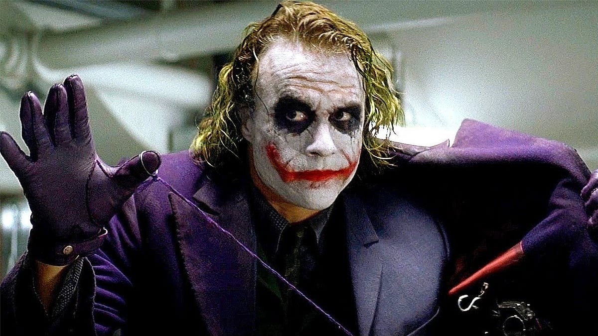 The Joker intimidates a crowd in The Dark Knight