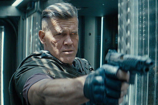 Josh Brolin's Cable holding a gun