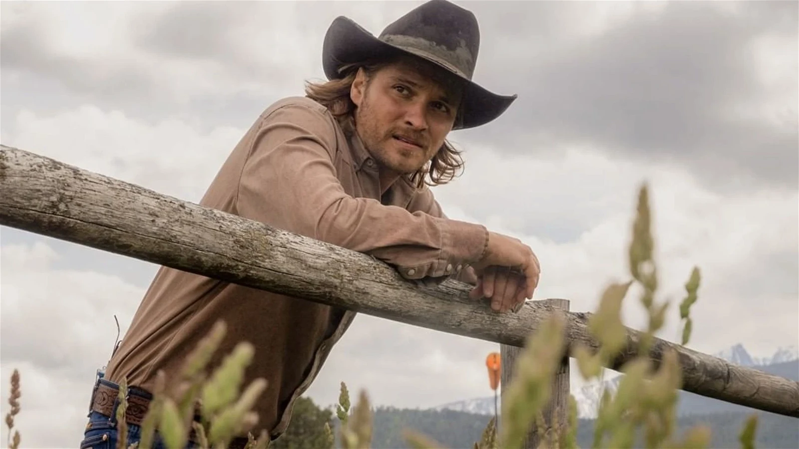 Luke Grimes as Kaycee Dutton stands in his ranch in Yellowstone