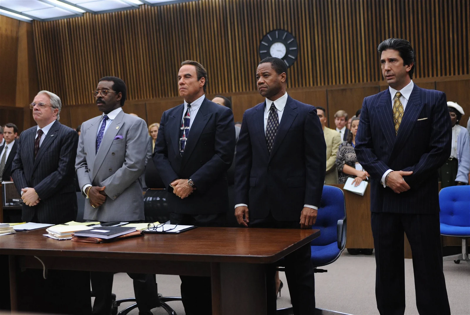 John Travolta with Cuba Gooding Jr. and David Schwimmer in The People v. O. J. Simpson