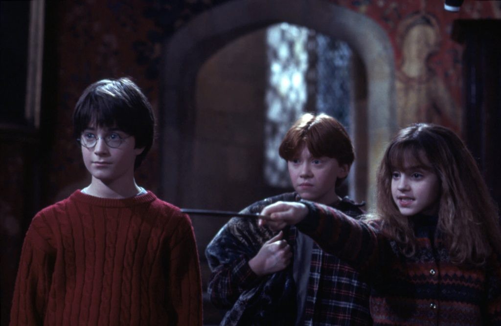 Central cast of Harry Potter in the common room in Harry Potter and the Philosopher's Stone