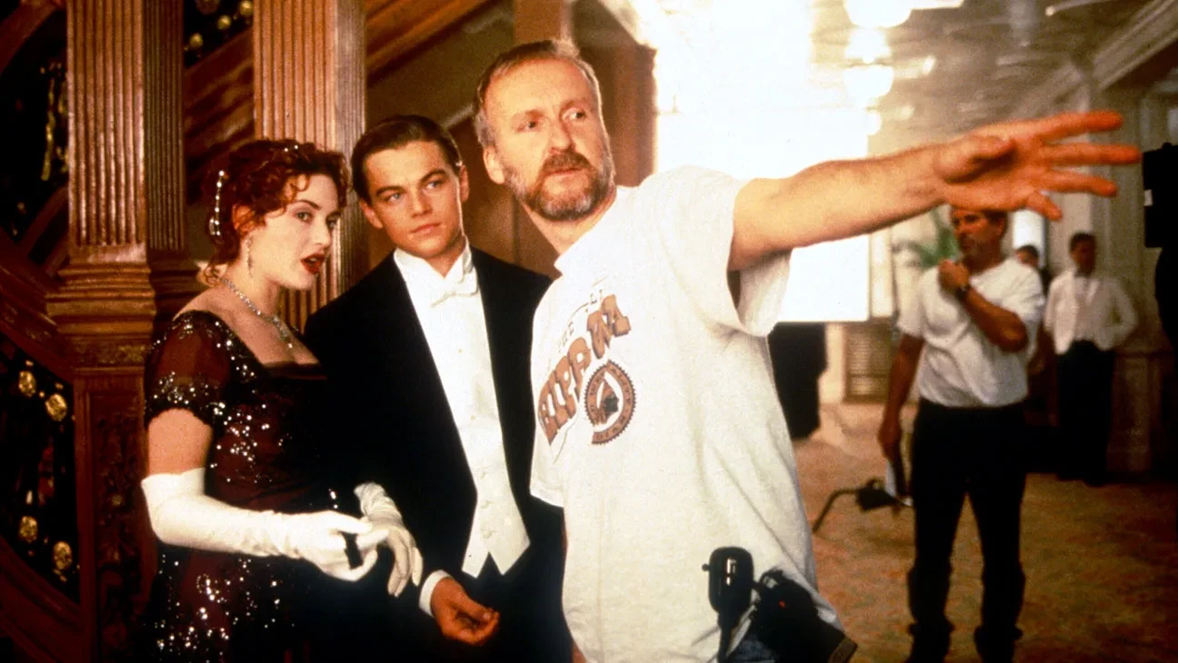 James Cameron works with his actors on the set of Titanic | Credits: Paramount Pictures