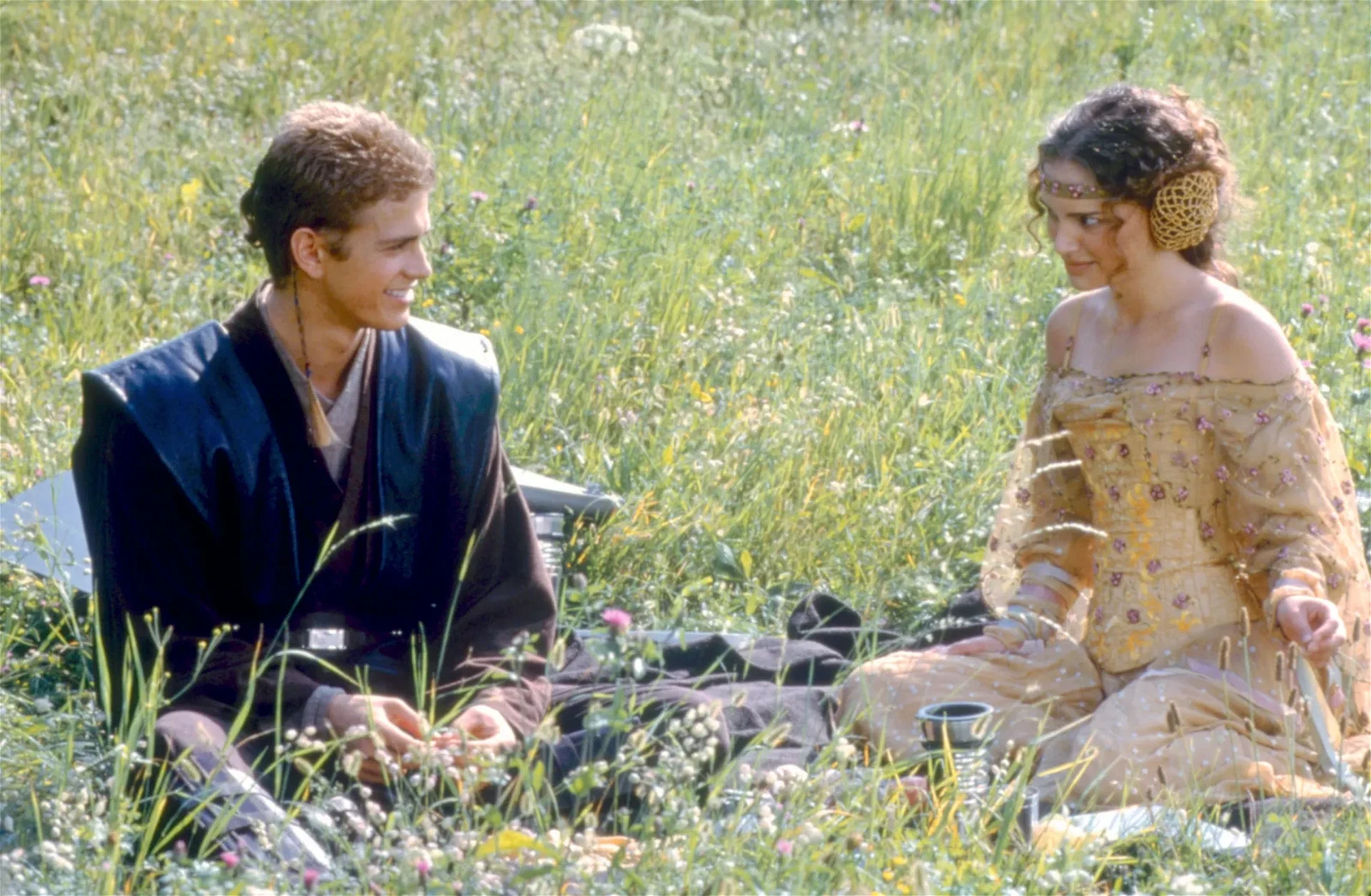 Natalie Portman and Hayden Christensen as Padmé Amidala and Anakin Skywalker, respectively