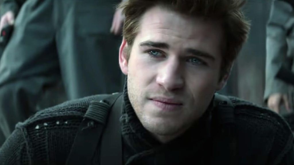 Liam Hemsworth in a still from The Hunger Games lore.