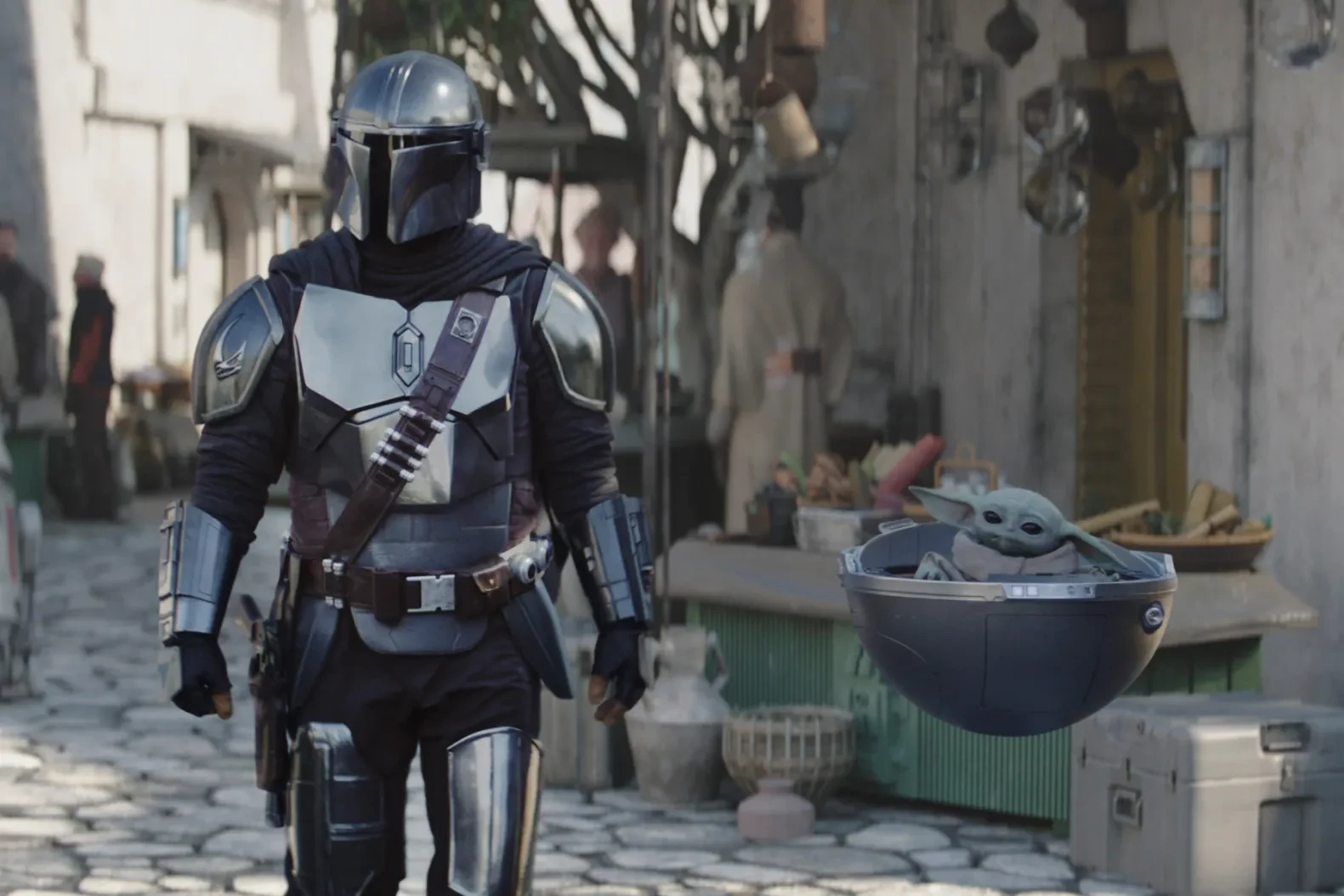 The Mandalorian and Grogu in a still from the Disney Plus series The Mandalorian