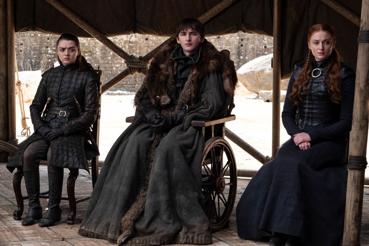 Sansa, Bran, and Arya Stark in the ending of George R.R. Martin's Game of Thrones