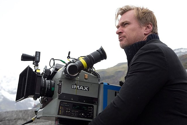 A still of Christopher Nolan on the sets of one of his films