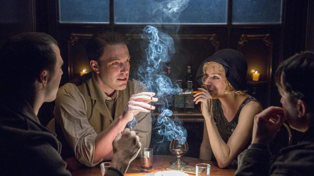 Sienna Miller and Ben Affleck in a still from Live By Night | RatPac-Dune Entertainment