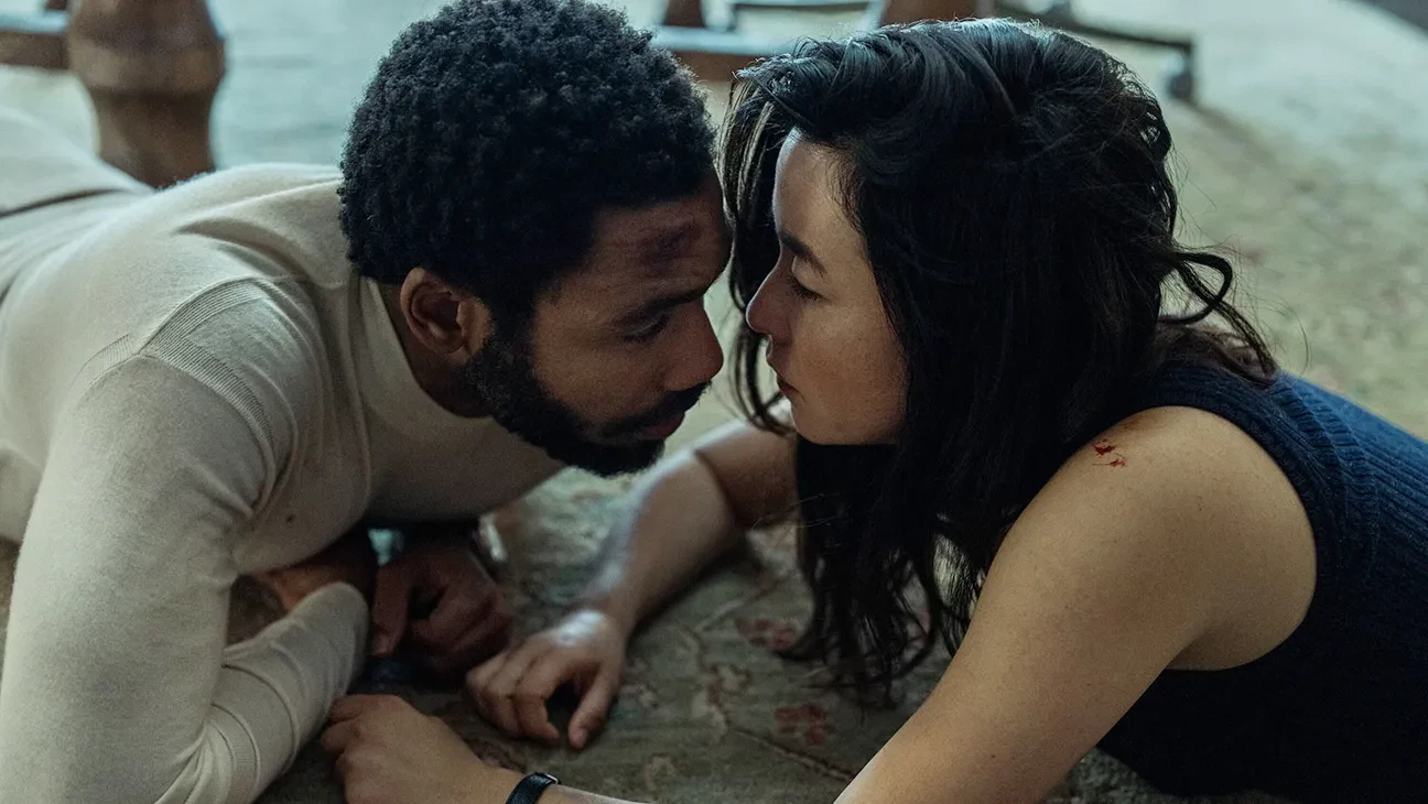 Donald Glover and Maya Erskine share a moment in the finale of Mr. & Mrs. Smith