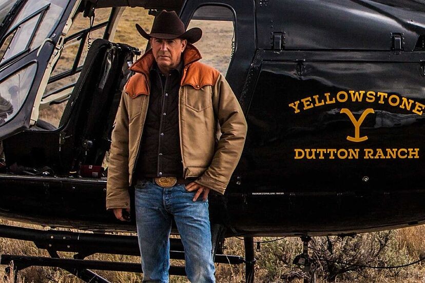 Kevin Costner as John Dutton next to helicopter in Yellowstone