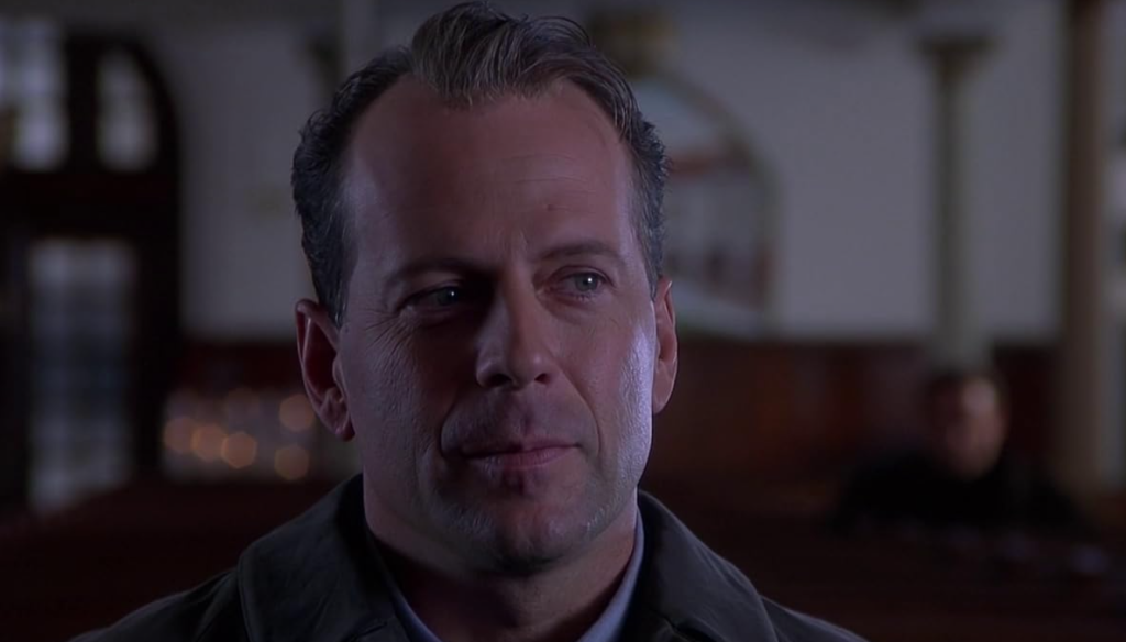 Close-up shot of Bruce Willis' face in The Sixth Sense, a movie with plot twist