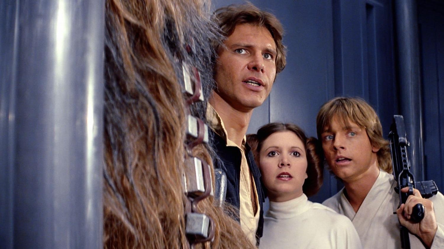 The leading trio of Luke, Han, and Leia, along with Chewbacca in Star Wars