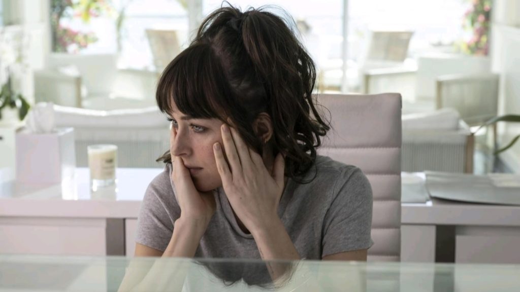 Dakota Johnson Diet: Weight Loss Routine of ‘Madame Web’ Actor Explored 3 Dakota Johnson appears to be in deep thinking with her head resting on her hand.