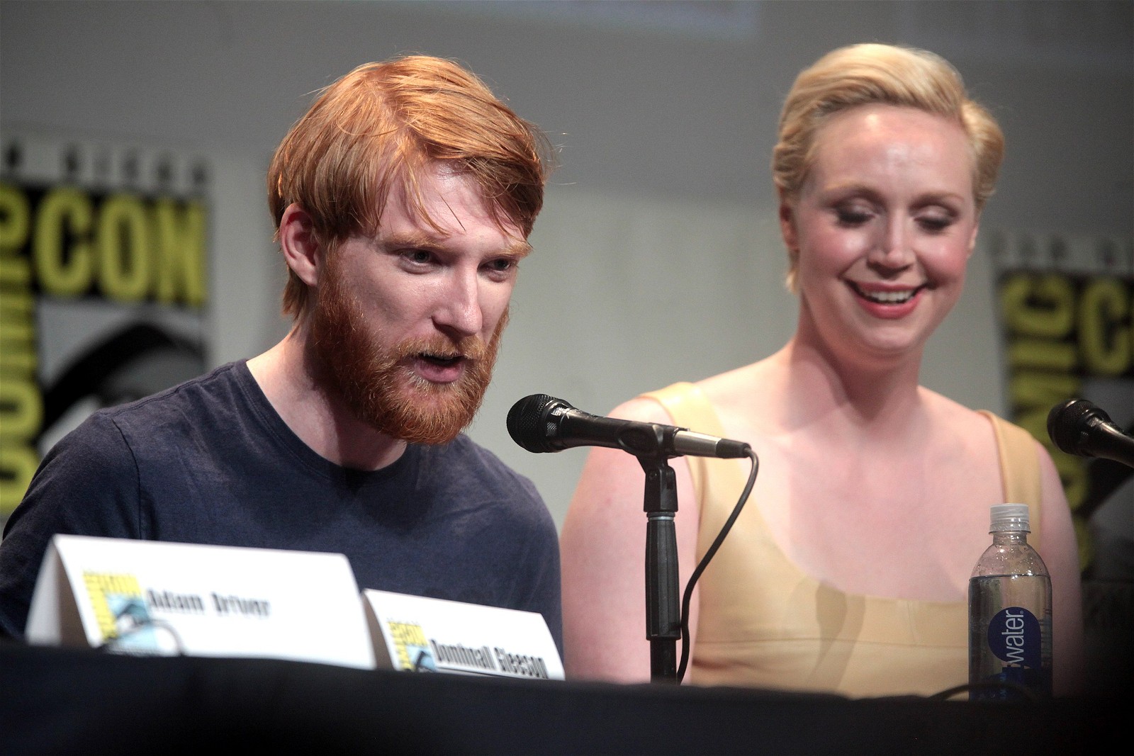 Domhnall Gleeson and Gwendoline Christie speaking at the 2015 San Diego Comic Con International | Gage Skidmore for Wikimedia Commons