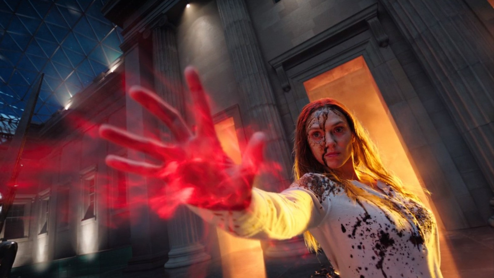 Elizabeth Olsen fighting Ultron bots as Wanda Maximoff in Doctor Strange in the Multiverse of Madness